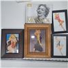 Image 1 : 3 pin up girs in frames, 1 marilyn monroe picture and book