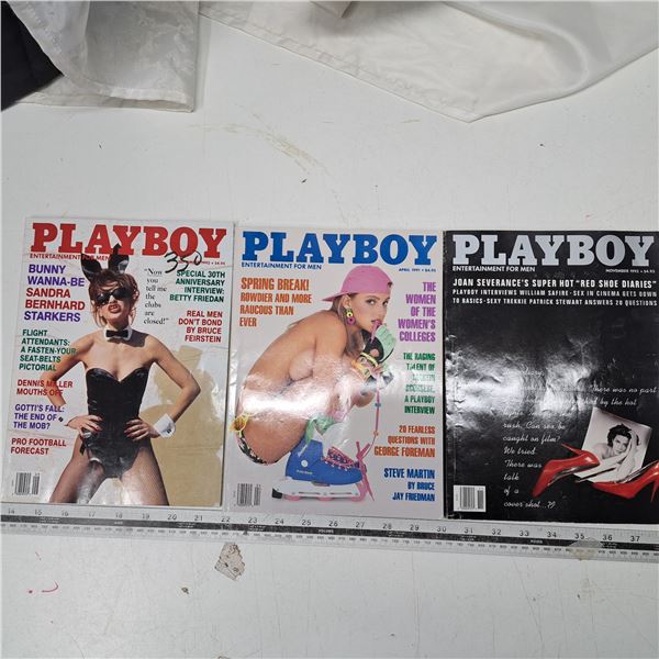 3 playboy magazines