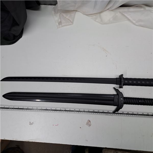 Plastic black swords