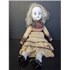 Image 1 : Vintage porcelain doll. About 18 inches tall.