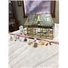 Image 3 : Glass and brass miniature house with mostly crystal and other knickknacks.