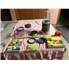 Image 1 : Likely never used juicer/vegetable processor 5.5” (14.5 cm) wide base with parts. Not in th