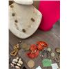 Image 6 : Variety of earrings and area in necklace. Large orange earrings are very cool