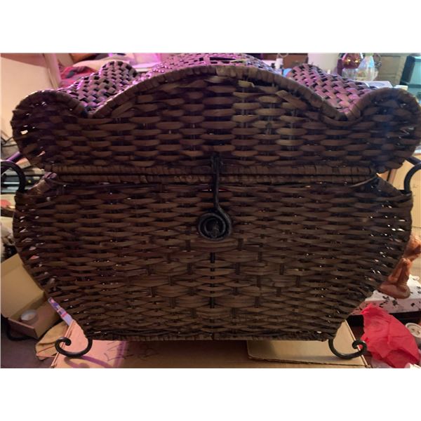 Vintage small wicker basket with cast iron feet