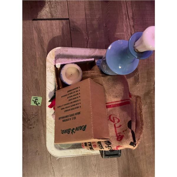 bedtray with assorted items, wedgewood blue bottle, gunny sack , rainbird water regulator, silver ca