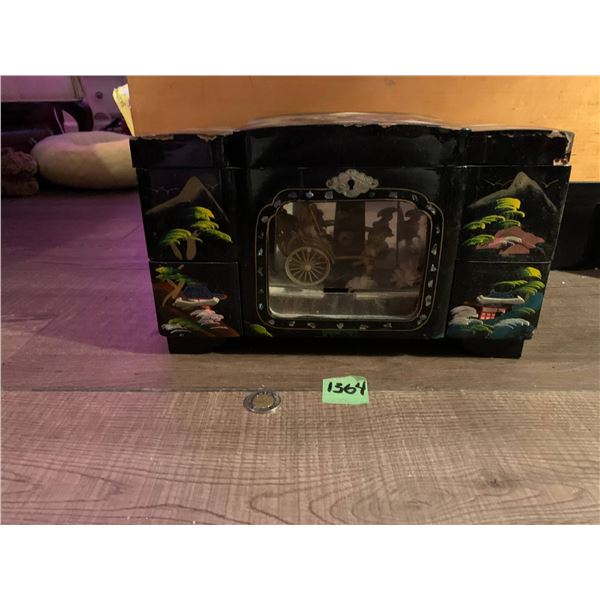 large japanese epoxy jewlry box - rickashaw in the center moves- music works. needs some repairs