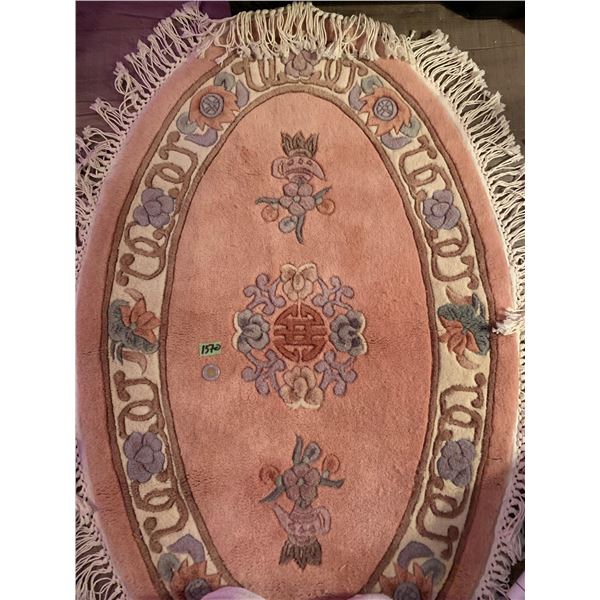 Its very rare to find an area rug in this good of shape. Antique peach wool rug - in excellent condi