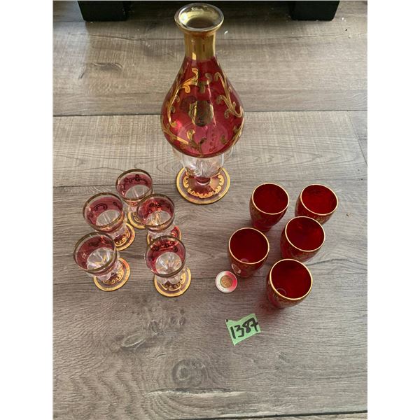 Very rare 1920 red and gold glass decanter and glasses. No chiipns cracks or damage - in excellent c