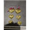 Image 1 : Pair of filagree brass heart hangers - three hearts per string