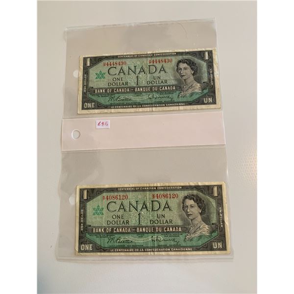 Pair of 1967 canadian $1 bills with serial numbers