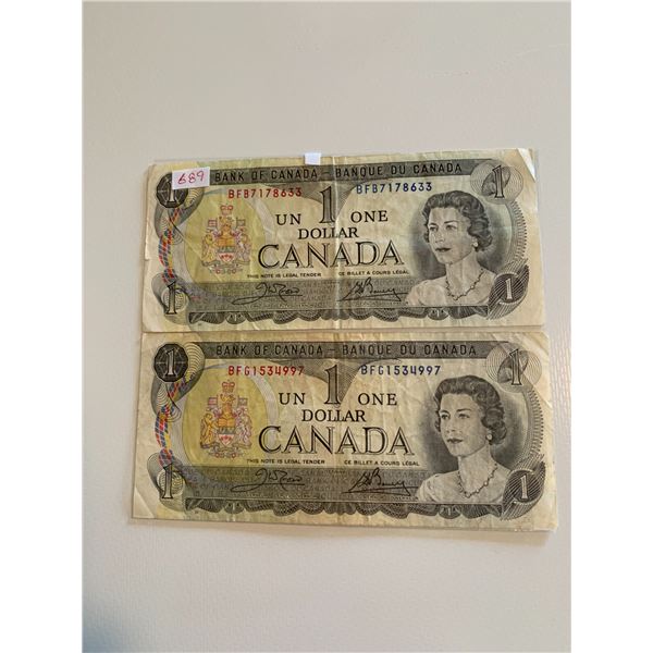 Pair of 1973 canadian $1 bills