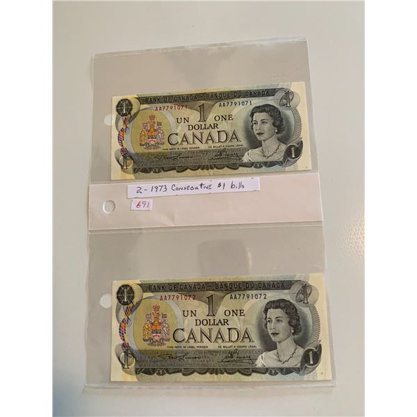 Pair of 1973 canadian $1 bills-consecutive