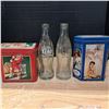Image 1 : 2 glass coke bottles and 2 coca cola tins