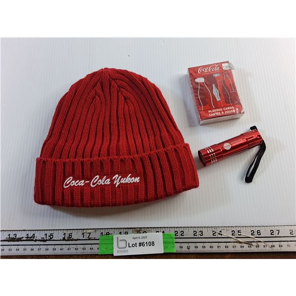 New Coca Cola Yukon Toque and Whitehorse Coca Cola Flashlight and Playing Cards