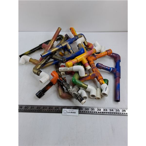 Assorted Pieces of Painted PVC Piping