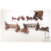 Image 1 : Four vintage cast metal toys including three horse drawn fire engines and one horse drawn US Mail