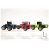 Image 1 : Three die-cast 1:32 scale, four wheel drive farm tractors including Ford 846, Massey-Ferguson 4900 a