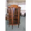Image 1 : Antique triple curved glass, single door, oak display cabinet with carved claw feet 68" in height in