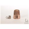 Image 1 : Antique English gold thimble, size 9, tests as 10kt plus a tiny silver thimble charm