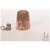 Image 4 : Antique English gold thimble, size 9, tests as 10kt plus a tiny silver thimble charm
