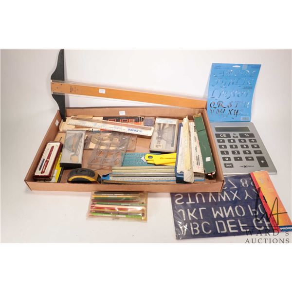 Selection of architectural drawing tools including T-square, slide rules, assorted stencils, rulers,