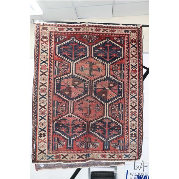 100% handmade Iranian wool carpet "Bakhtyar" with overall geometric design, red background and highl