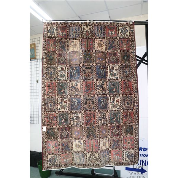 100% handmade Iranian wool carpet "Bakhtyar" with overall tile design featuring flora and fauna and 