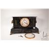 Image 1 : Antique tin, slate style chiming mantle clock with attached ram head garnitures, white sunk enamel d