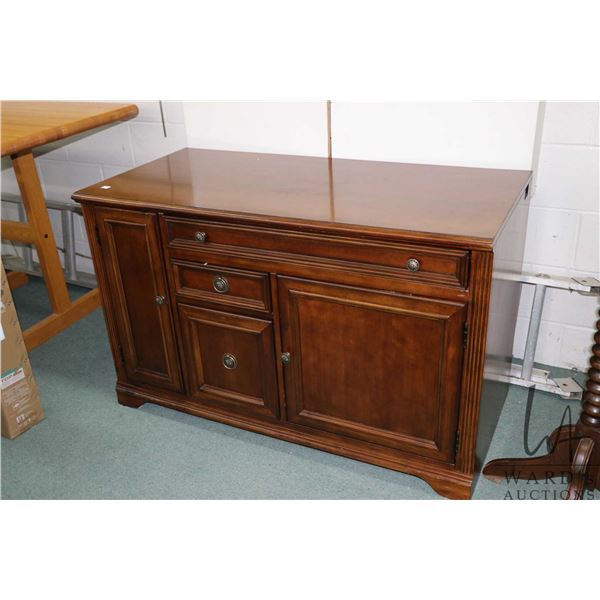 Modern credenza style desk with pull out keyboard drawer fitted with power bar, made by Hooker Furni