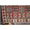 Image 2 : 100% handmade Iranian wool carpet "Lory" with overall geometric design and red background, highlight