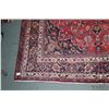 Image 2 : 100% handmade Iranian wool carpet "Mashad" with center medallion, red background and overall floral 