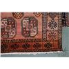 Image 2 : 100% handmade Iranian wool carpet "Turkman" with overall geometric design and red background, highli
