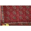 Image 2 : 100% handmade Iranian wool carpet "Turkman" with overall geometric design, red background and highli