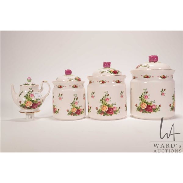 Royal Albert Old Country Roses three piece canister set and a nightlight