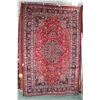 Image 1 : 100% handmade Iranian wool carpet "Mashad" with center medallion, red background and overall floral 