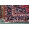 Image 2 : 100% handmade Iranian wool carpet "Mashad" with center medallion, red background and overall floral 