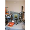 Image 1 : Belsaw electric grinder with table and cutting wheel, includes manual, working at time of cataloguin