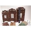 Image 3 : Three carved Indonesia masks and a carved wooden folding frame 19" X 28"