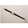 Image 1 : Ladies Gucci wrist watch with genuine leather Gucci strap, new battery, working at time of catalogui