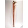 Image 2 : Two walking sticks including stick with turned brass pommel, 35" in height and 34" with brass bird t