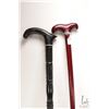 Image 1 : Two wooden canes including vintage black turned and carved and a 36 1/2" height cane