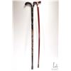 Image 2 : Two wooden canes including vintage black turned and carved and a 36 1/2" height cane