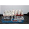 Image 1 : Four 6 packs of Smirnoff Vodka & Soda Berry Blast cans/ 24 count X 355 ml / 5.0% ABV   Note: Alcohol