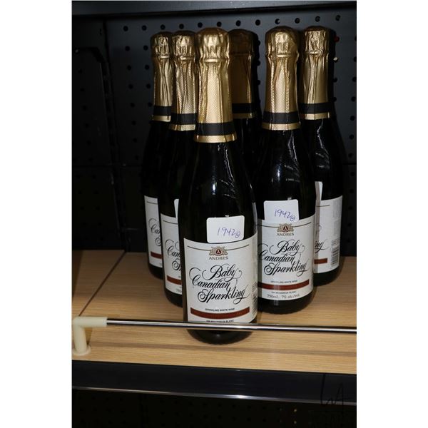 Six bottles of Andres Baby Canadian Sparkling white wine 750ml / 7% ABV  Note: Alcohol cannot be ins