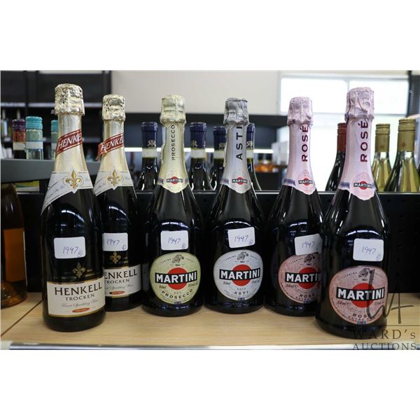 Six assorted bottles of wine including two Henkell Trocken finest dry sparkling wine, two Martini Ro
