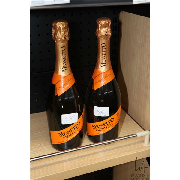 Two bottles of Mionetto Prosecco Note: Alcohol cannot be insured by any courier in Canada. Local pic