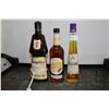 Image 1 : Three assorted bottles of liquor including one Frangelico Liquor 750ml / 20% ABV, one Phillips Butte
