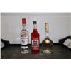 Image 1 : Three assorted bottles of liquor including one Luxardo Sambuca 750ml, one Phillips Hot 100 Cinnamon 