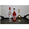 Image 1 : Three assorted bottles of liquor including one Luxardo Sambuca 750ml, one Phillips Hot 100 Cinnamon 