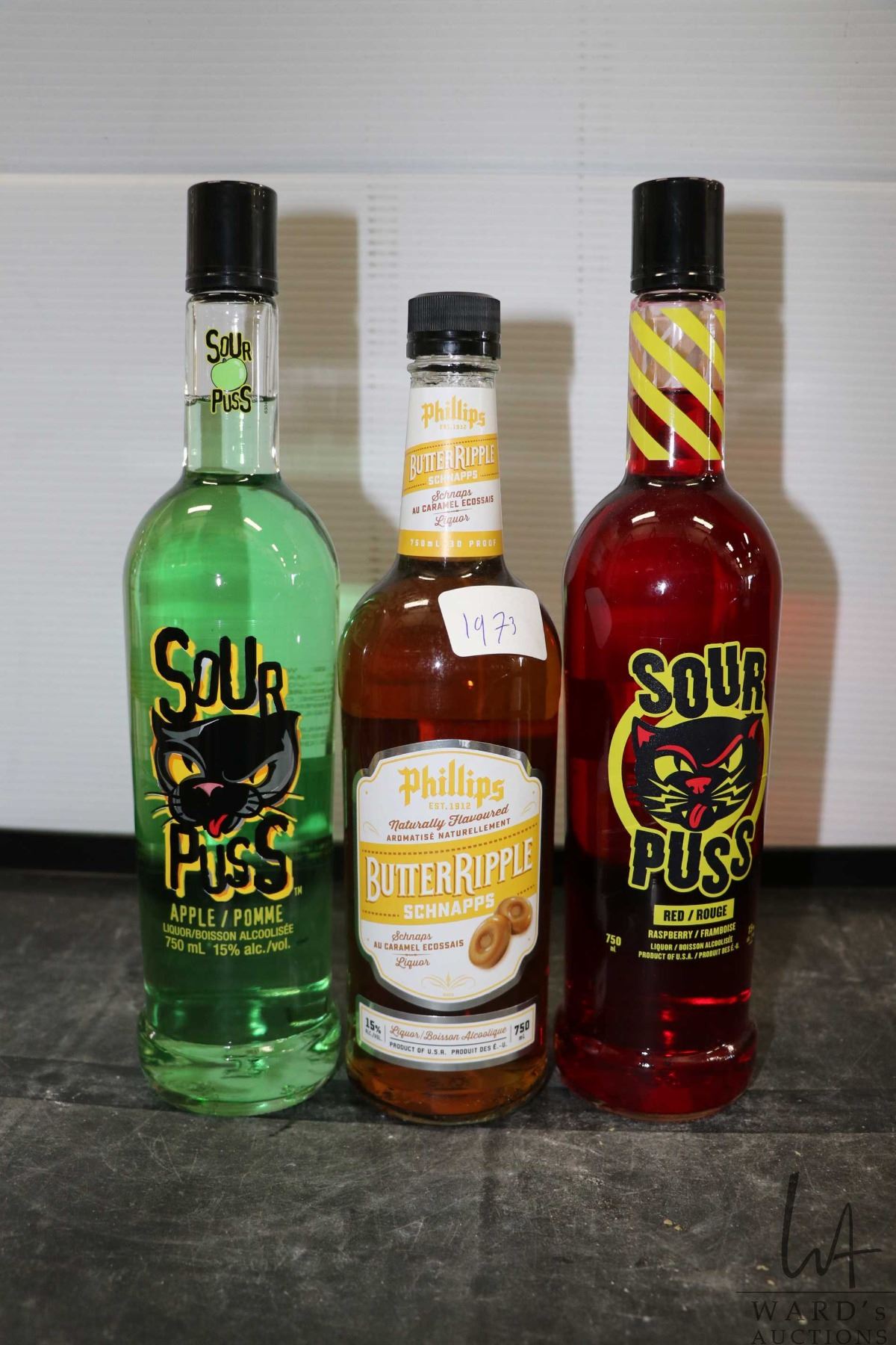 Phillips Butter Ripple Three assorted bottles of liquor including one Phillips Butter Ripple ...